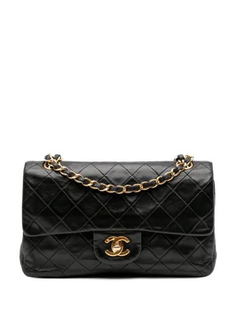 1991-1994 Small Classic Lambskin Double Flap shoulder bag by CHANEL 1991-1994 Small Classic Lambskin Double Flap shoulder bag by CHANEL