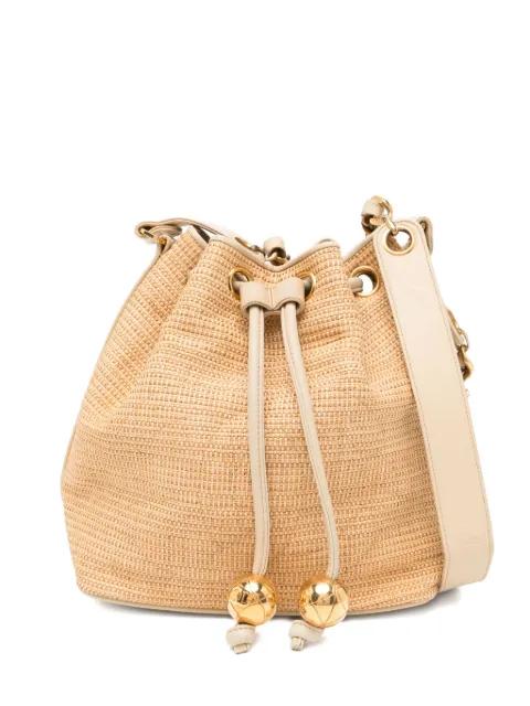 1992 Raffia Straw Jute Gold CC Balls Drawstring Bucket Bag by CHANEL 