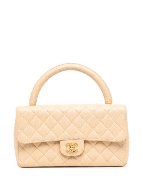 1997 medium Classic Flap top-handle bag by CHANEL 
