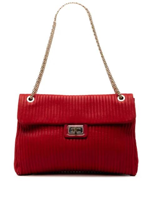 2010-2011 Maxi Vertical Quilted Calfskin Mademoiselle Lock Bijoux Flap shoulder bag by CHANEL 
