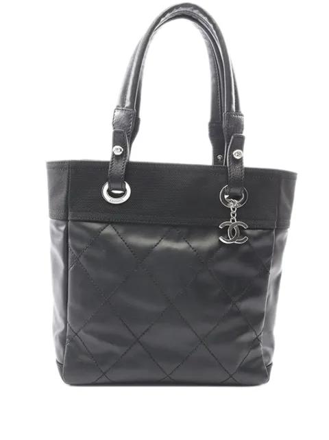 2010-2011 Small Quilted Coated Canvas Paris Biarritz tote bag by CHANEL 