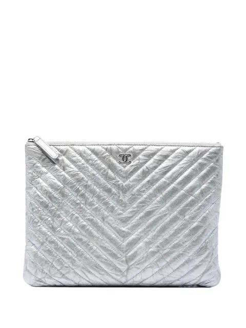 2018 Medium Chevron Metallic Aged Calfskin O Case clutch bag by CHANEL 