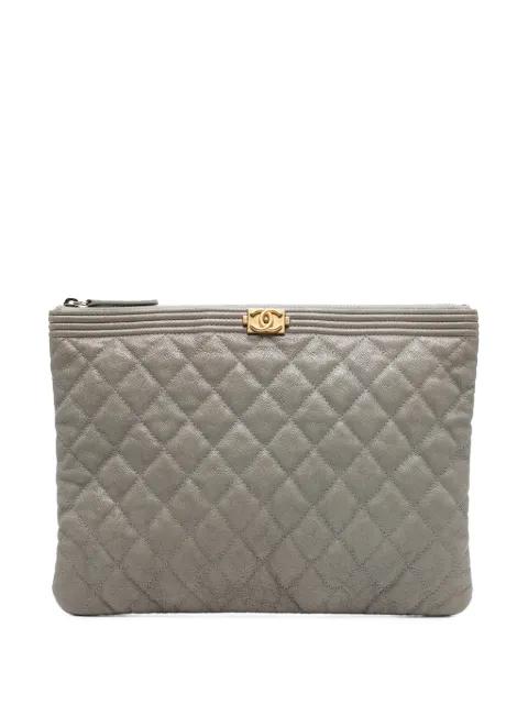 2019 Medium Quilted Caviar Boy O Case clutch bag by CHANEL 