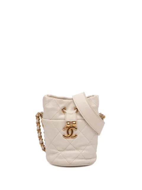 2021-2025 Mini Quilted Caviar Twist Your Buttons Drawstring bucket bag by CHANEL 