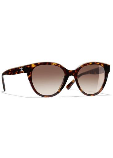 Butterfly-frame sunglasses by CHANEL