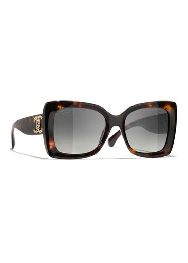 Butterfly-frame sunglasses by CHANEL