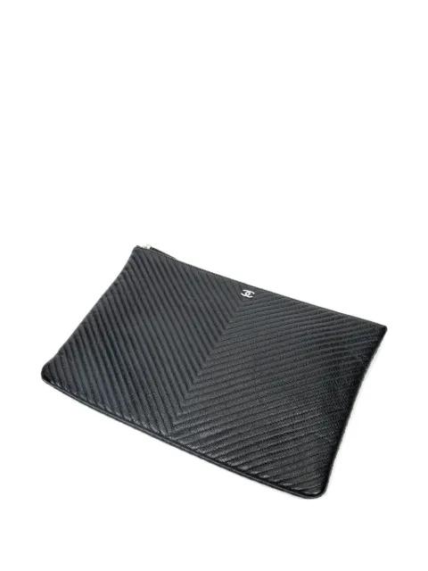 CC chevron-quilted  clutch bag by CHANEL 