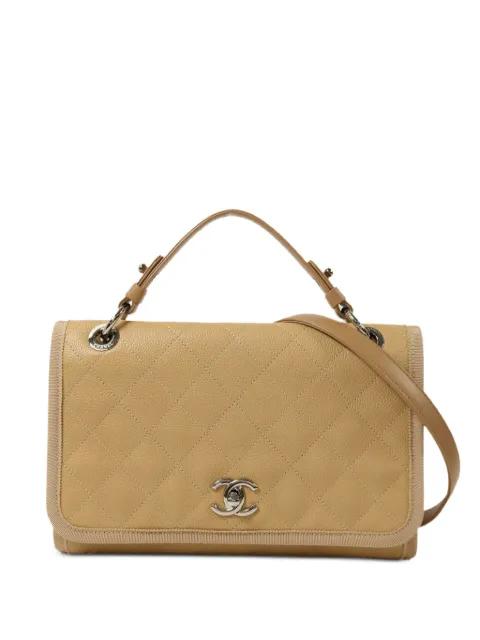 CC turn-lock quilted crossbody bag by CHANEL 