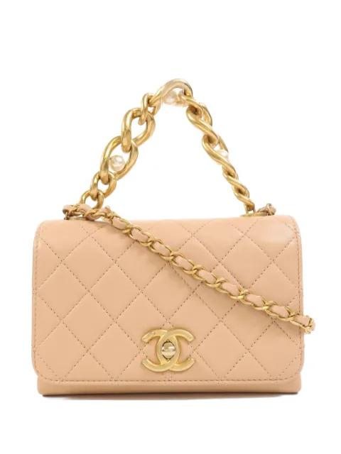 CC turn-lock quilted crossbody bag by CHANEL 