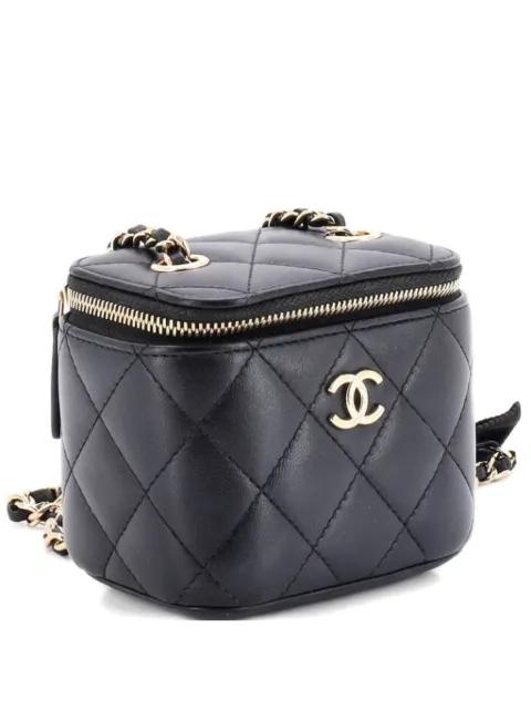 Camellia Bow Vanity Case with Chain Quilted Lambskin Mini crossbody bag by CHANEL 