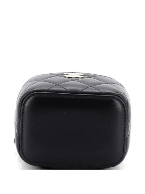 Camellia Bow Vanity Case with Chain Quilted Lambskin Mini crossbody bag by CHANEL 