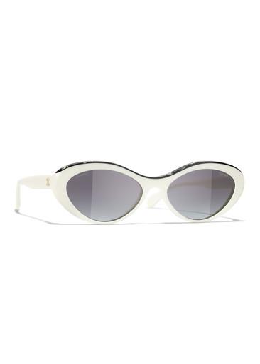 Cat-eye sunglasses by CHANEL