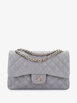 Classic Double Flap Bag Quilted Caviar Jumbo shoulder bag by CHANEL 