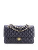 Classic Double Flap Bag Quilted Caviar Medium shoulder bag by CHANEL 
