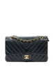 Classic Double-Flap shoulder bag by CHANEL Classic Double-Flap shoulder bag by CHANEL