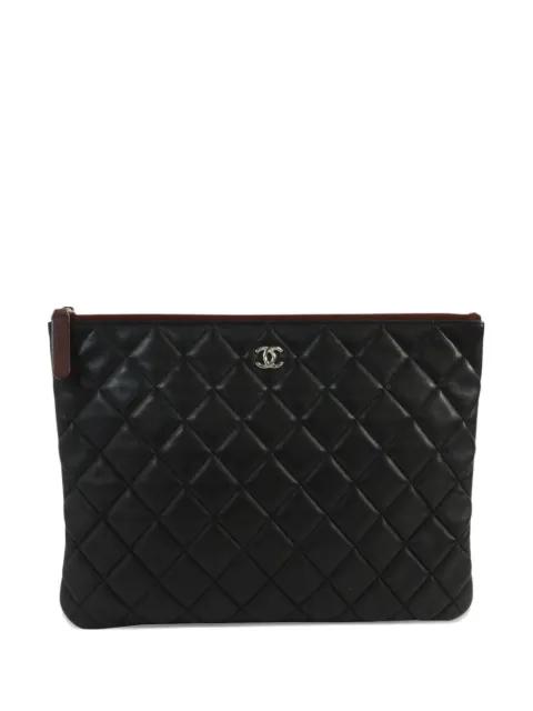 Classic O-Case clutch bag by CHANEL 