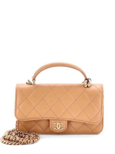 Classic Top Handle Flap Phone Holder with Chain Quilted Lambskin crossbody bag by CHANEL 