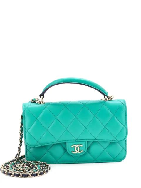 Classic Top Handle Flap Phone Holder with Chain Quilted Lambskin crossbody bag by CHANEL 