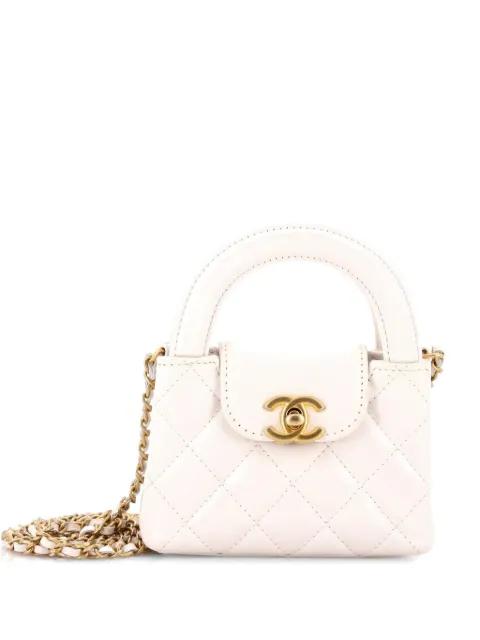 Kelly Top Handle Shopping Bag Quilted Shiny Aged Calfskin Nano crossbody bag by CHANEL 