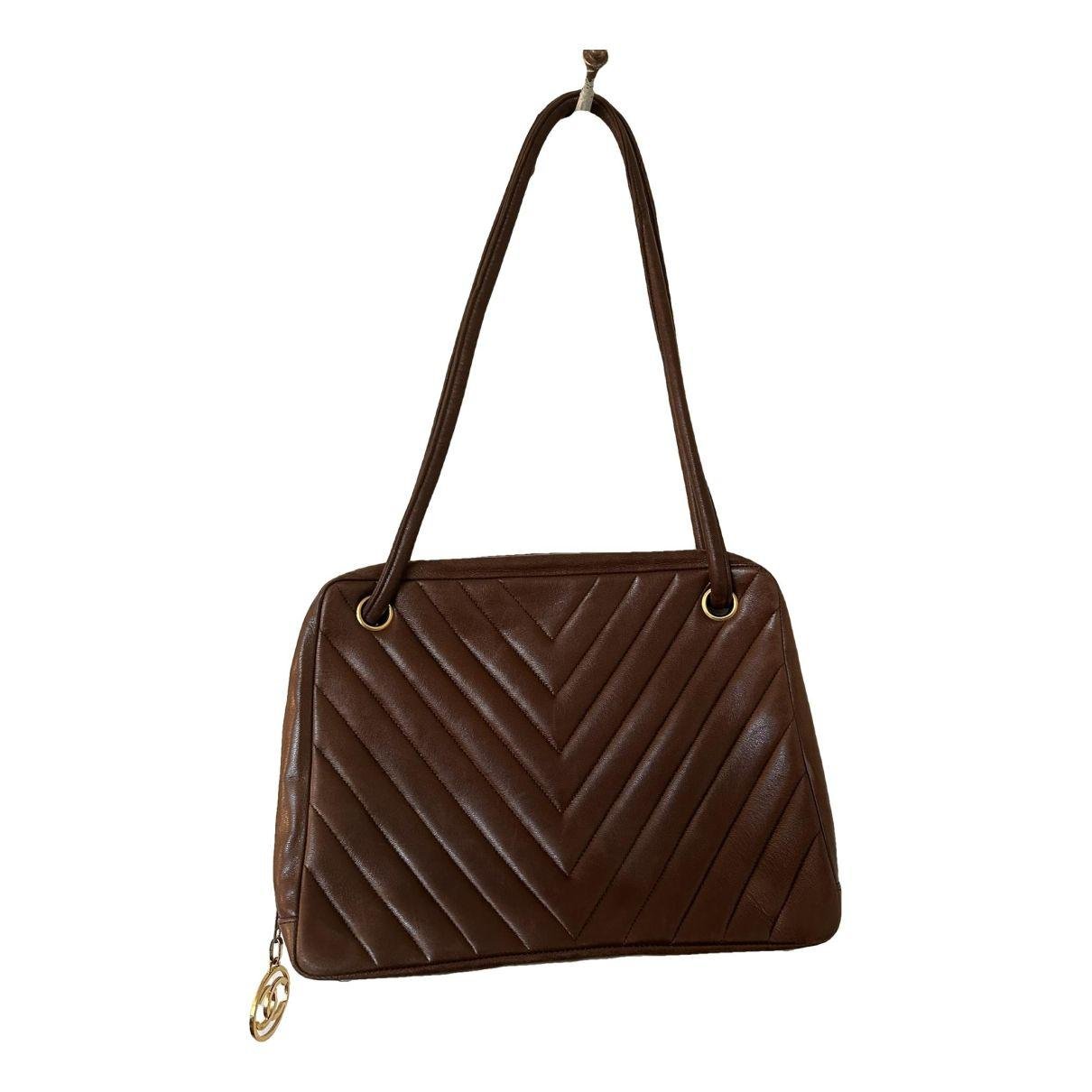 Leather handbag by CHANEL