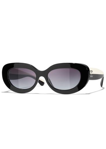 Oval-frame sunglasses by CHANEL