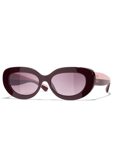 Oval-frame sunglasses by CHANEL
