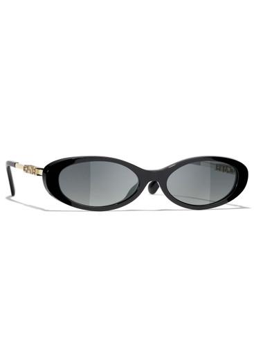Oval-frame sunglasses by CHANEL