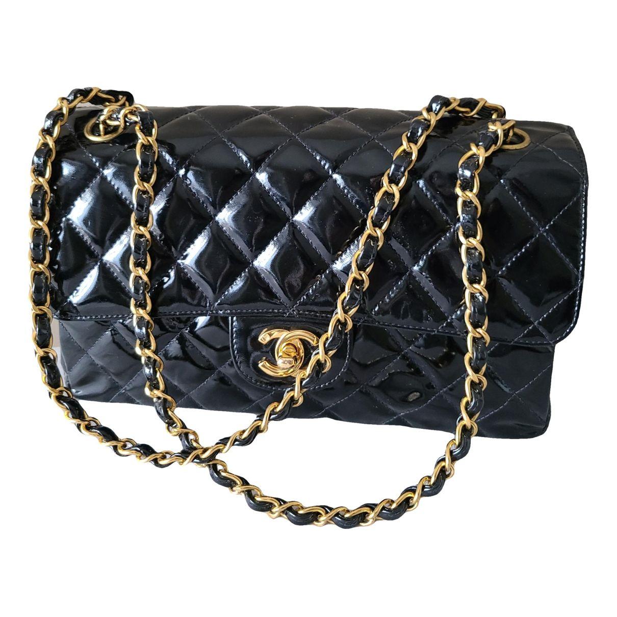 Patent leather handbag by CHANEL