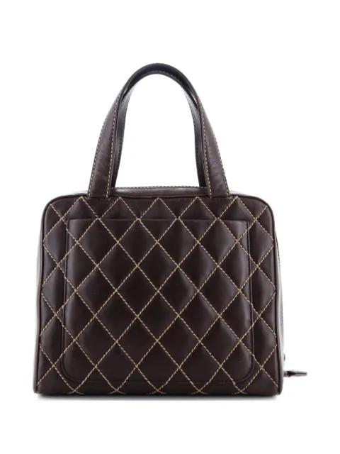 Surpique Zip Around Quilted Leather Medium satchel by CHANEL 