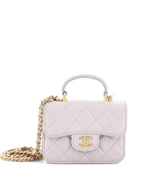 Top Handle Flap Coin Purse with Chain Quilted Lambskin crossbody bag by CHANEL 