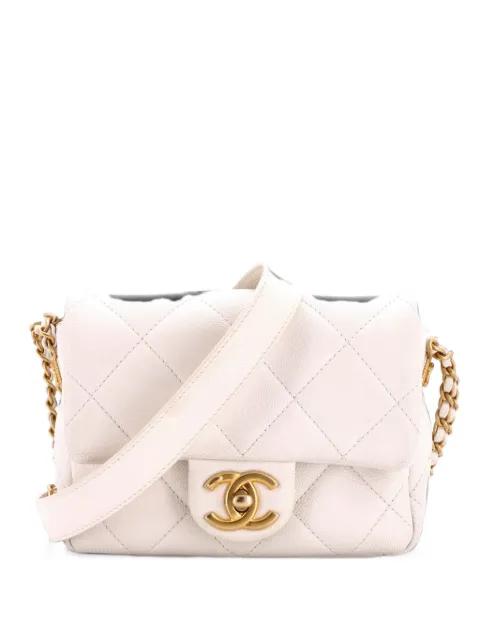 Twist Your Buttons Flap Bag Quilted Caviar Mini crossbody bag by CHANEL 