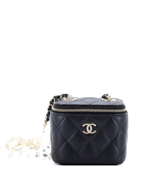 Vanity Case with Pearl Chain Quilted Lambskin Mini clutch bag by CHANEL 