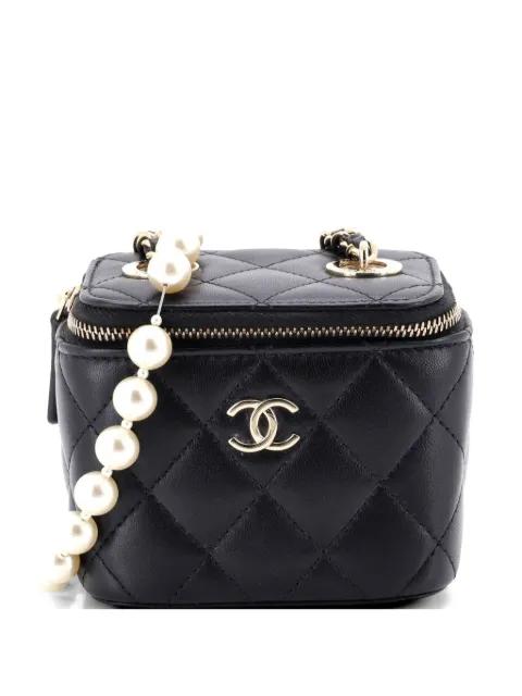 Vanity Case with Pearl Chain Quilted Lambskin Mini clutch bag by CHANEL 
