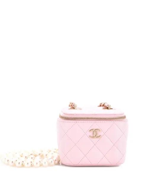 Vanity Case with Pearl Chain Quilted Lambskin Mini clutch bag by CHANEL 