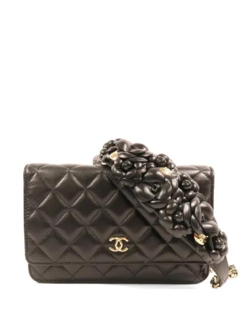 Wallet On Chain Camellia quilted crossbody bag by CHANEL 