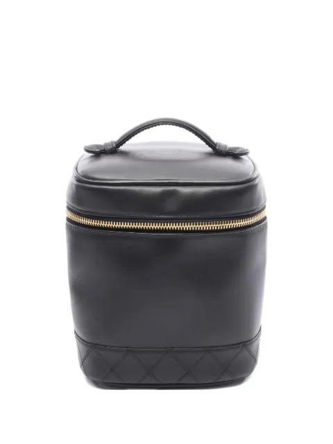 diamond-quilted vanity bag by CHANEL 