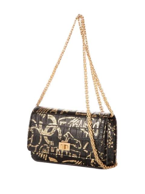 gold-print chain bag by CHANEL 