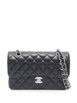 medium black quilted caviar leather cross body bag by CHANEL medium black quilted caviar leather cross body bag by CHANEL