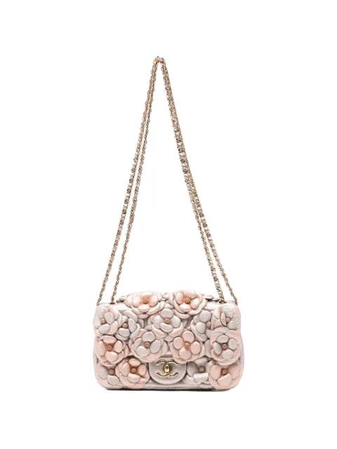 mini Camelia turn-lock cross body bag by CHANEL 