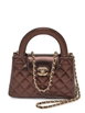 mini Kelly quilted tote bag by CHANEL mini Kelly quilted tote bag by CHANEL