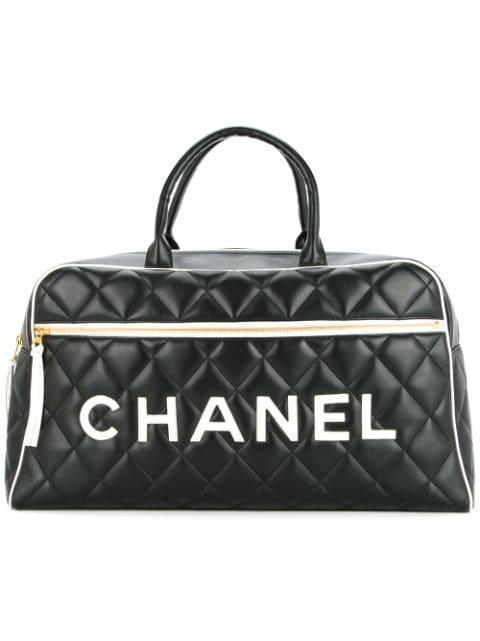 quilted luggage handbag by CHANEL 