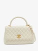 small Coco Handle quilted shoulder bag by CHANEL small Coco Handle quilted shoulder bag by CHANEL