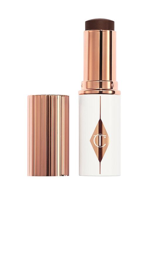 Charlotte Tilbury Unreal Skin Sheer Glow Tint Hydrating Foundation Stick in 17 Deep by CHARLOTTE TILBURY