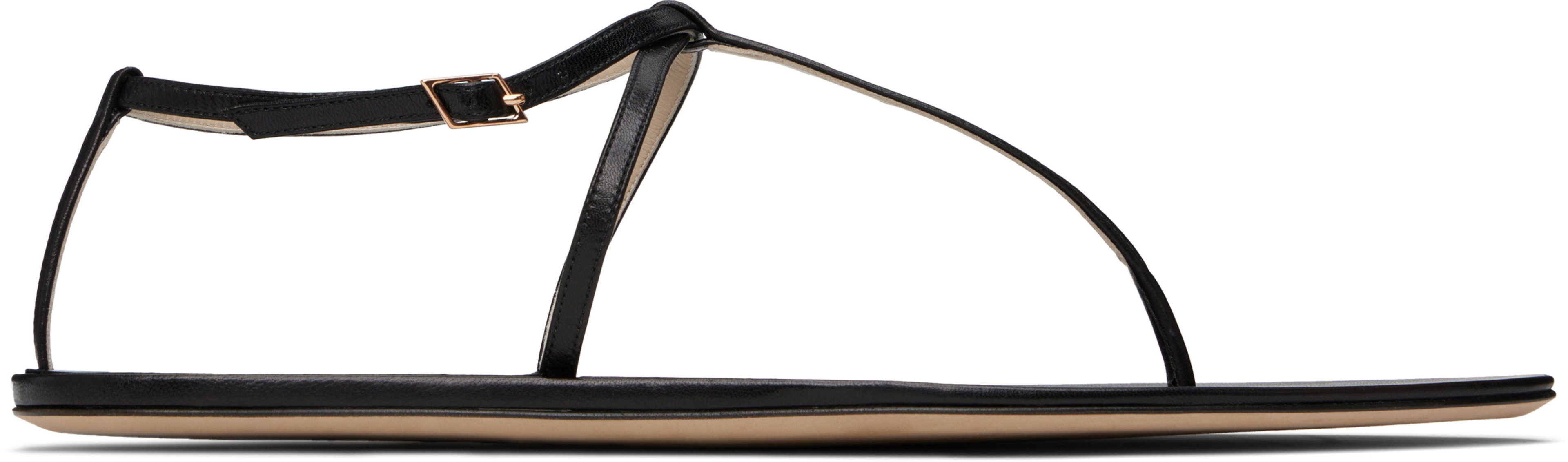 Black Mono Strap Flat Sandals by CHRISTEN