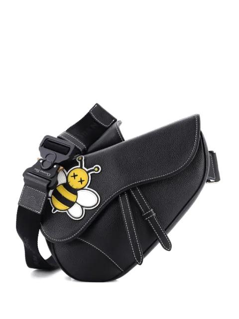 KAWS Saddle Leather with Applique crossbody bag by CHRISTIAN DIOR 