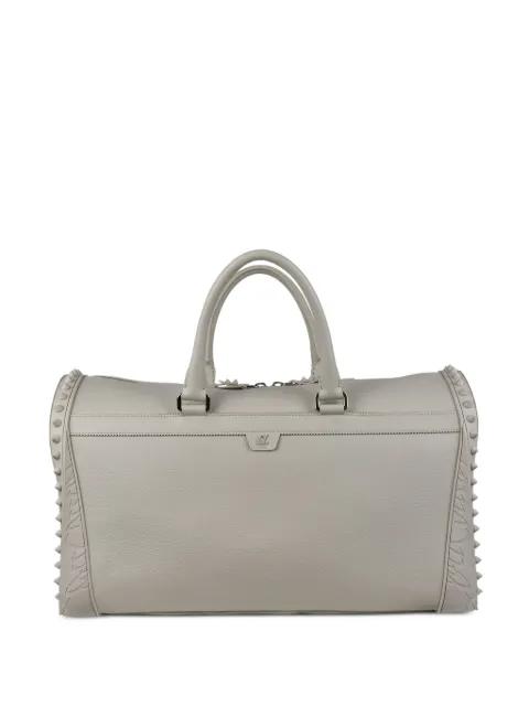 embossed studs leather travel bag by CHRISTIAN LOUBOUTIN