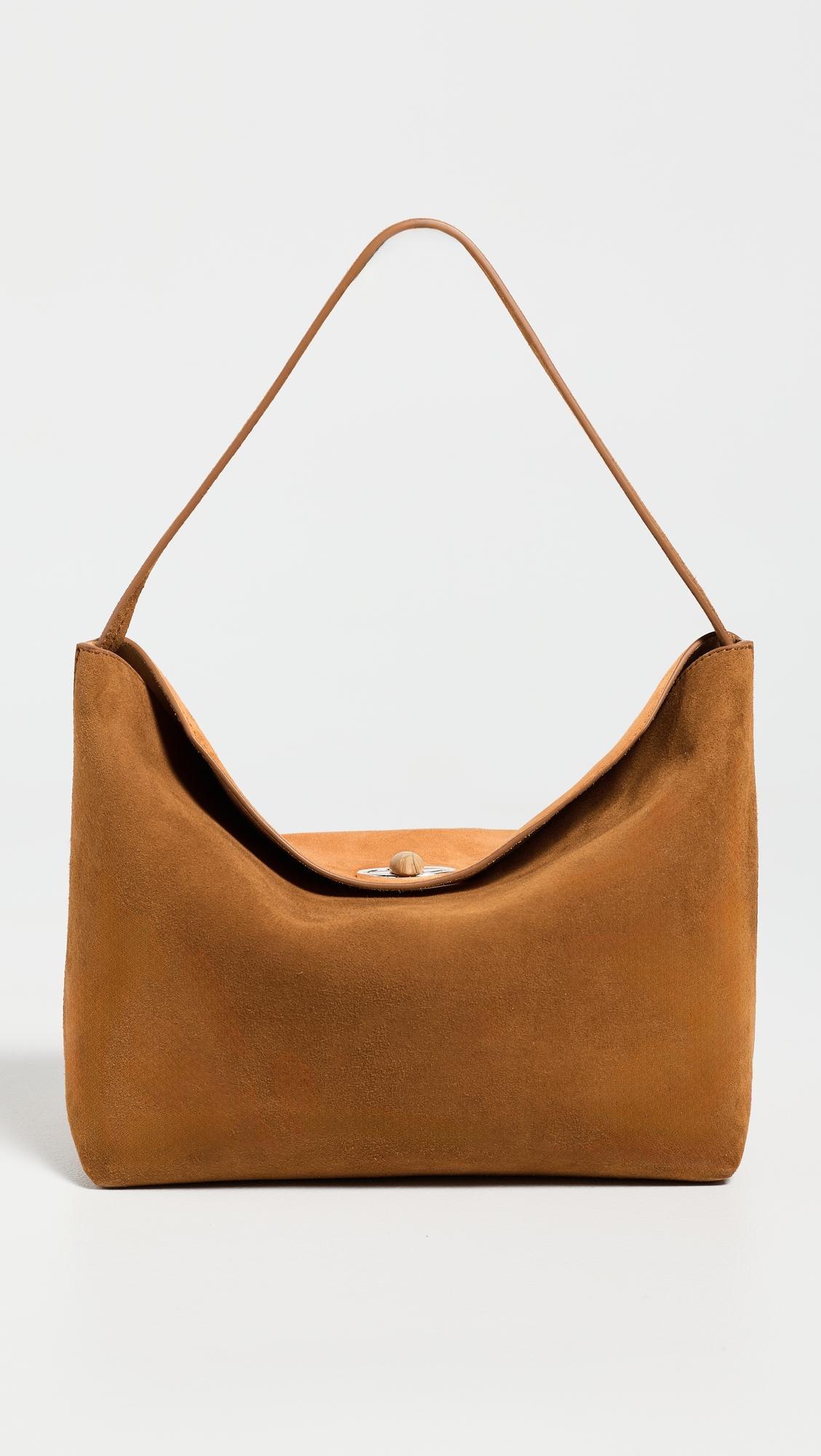 Turnlock Suede Shoulder Bag by CHRISTOPHER ESBER