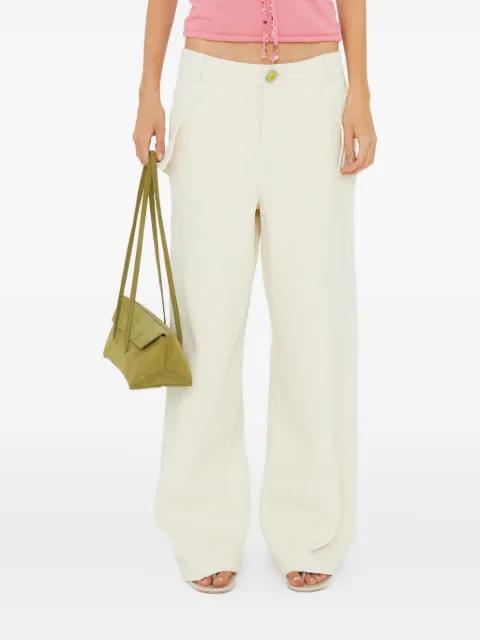 button-fastening trousers by CHRISTOPHER ESBER