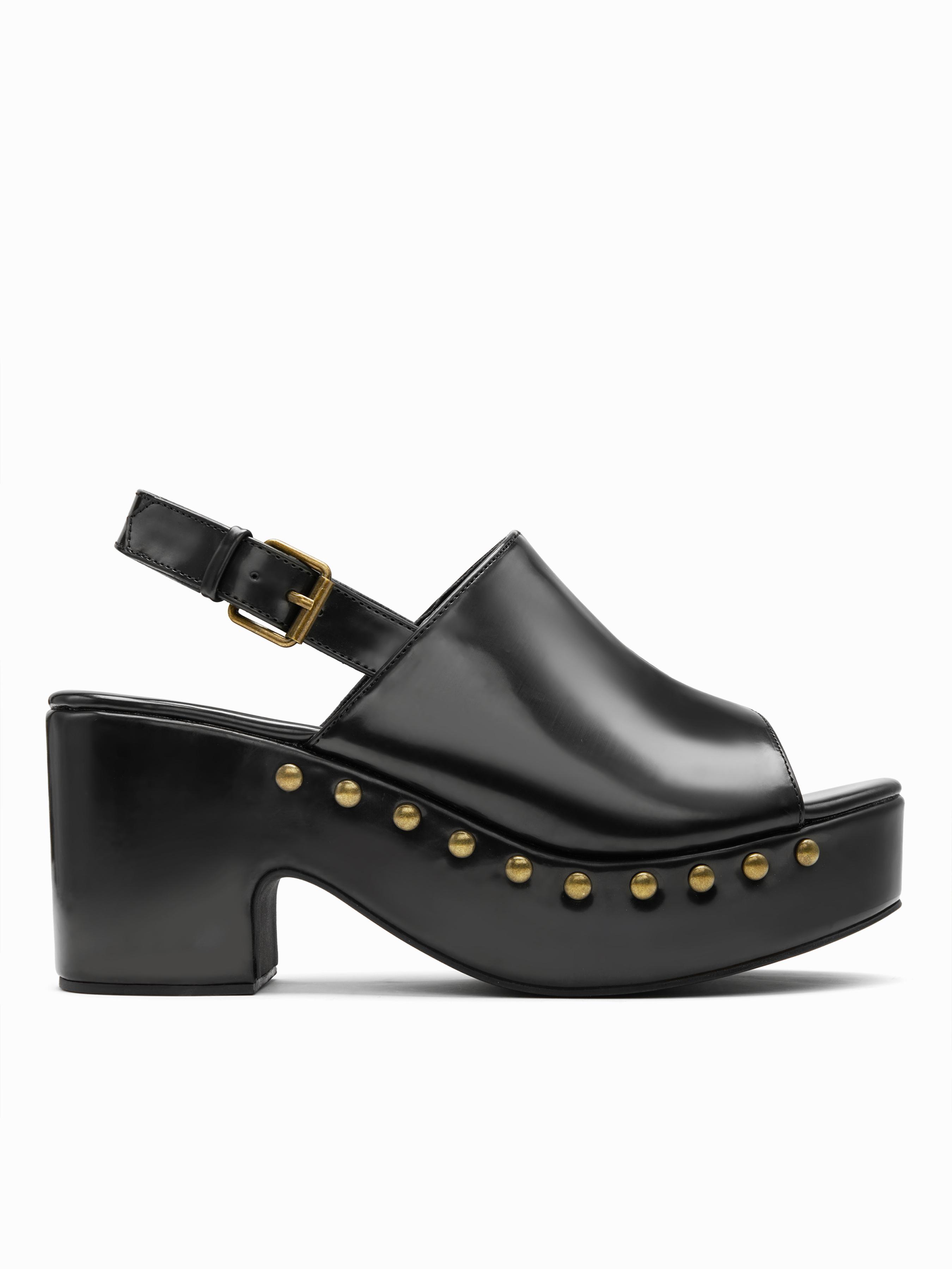 BUCKLE STUDDED PLATFORM MULE SANDALS by CIDER