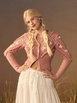 Cardigan au crochet avec broderie florale en maille, finitions pompon by CIDER